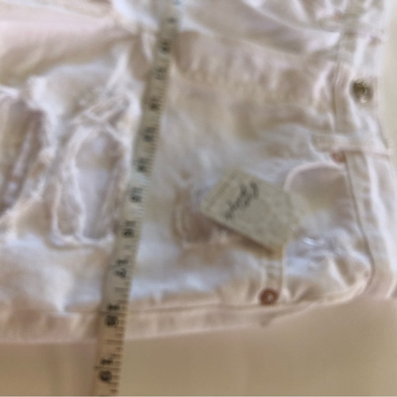 Free People Optic White Maggie Mid-Rise Button Front Fly Distressed Jean Shorts - Picture 8 of 14
